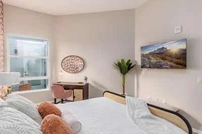 a bedroom with a bed with teddy bears on it at Eclectic Fast Wi-Fi Parking Pets Bohemian in San Diego