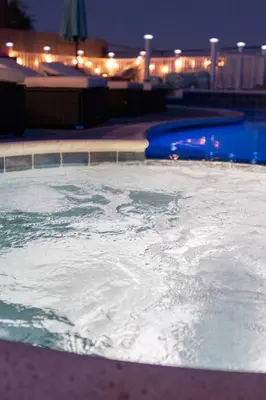 a swimming pool at night with icy water at Upscale Resort House, Views, Saltwater Pool, Spa in Spring Valley