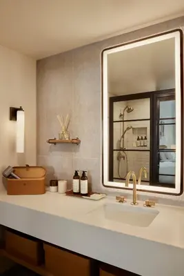a bathroom with a sink and a mirror at The Bower Coronado in San Diego