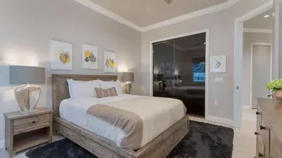 a bedroom with a bed and a room with a bathroom at Summit Ranch by AvantStay Infinity Pool Views in Temecula