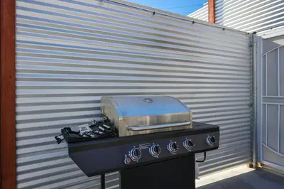 a grill with a toaster on top of it at Harborside Suite 12 with Hot Tub and King Beds in San Diego