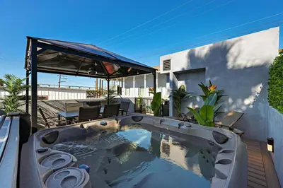 a swimming pool in the backyard of a house at Harborside Suite 12 with Hot Tub and King Beds in San Diego