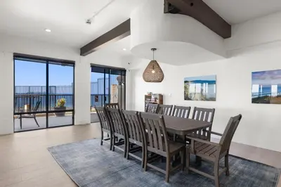 a dining room with a table and chairs at Breathtaking Bungalow - DMST22 in Solana Beach