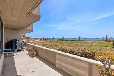 a porch with a view of the ocean at Surf, Sun, Sand - SUR106 in Solana Beach