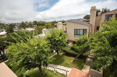an overhead view of a yard with trees and a house at High Tides & Good Vibes SUR169 in Solana Beach