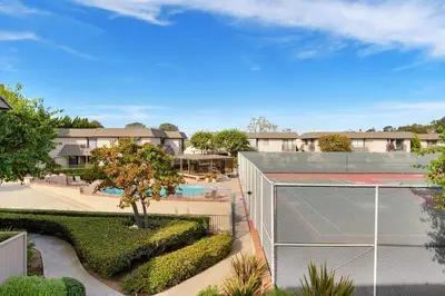 a view of a tennis court and a tennis racket at Sea'Esta by the Shore-DMBC852S in Solana Beach