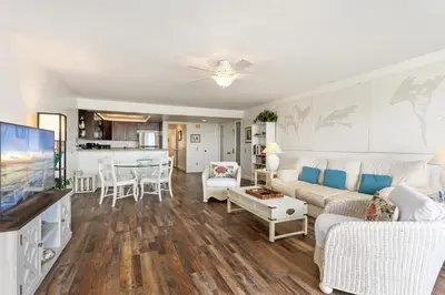 a living room with a couch and a table at Slow M'ocean - DMBC853A in Solana Beach