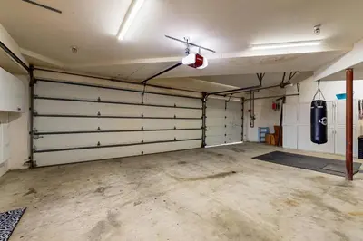 a garage with two garage doors in a room at Canyon Paradise in Encinitas