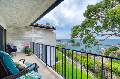 a balcony with a view of the ocean at Ocean Harbor View Dana Point in Dana Point