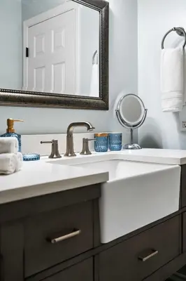 a bathroom with a sink and a mirror at O-Side Beach Bungalow with Jaccuzi Blocks to beach in Oceanside