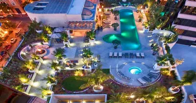 an aerial view of a pool at night at Luxurious and Spacious 2-Bedroom Condo Unit Downtown San Diego in the Heart of the Gaslamp Quarter - 14-Day Min in San Diego