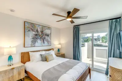 a bedroom with a bed and a ceiling fan at Balconies and Views Modern Abode in Poway! in Poway