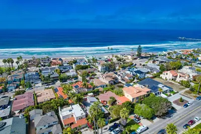 an aerial view of a city and the beach at Sunset Path La Jolla Shores in San Diego