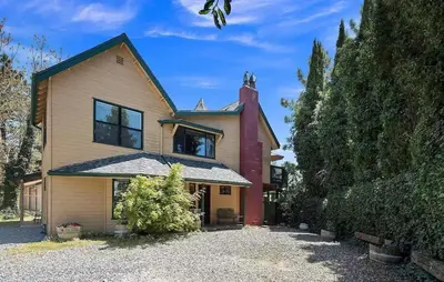 a large house with a garage at Autumn Room at Eaglenest Inn with Pool and SPA in Julian
