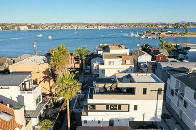 an aerial view of houses and the water at Ocean View Luxury Beach Homes With AC and Parking in San Diego