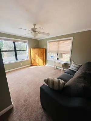 a living room with a couch and a ceiling fan at Whole House at Eaglenest Inn with Pool & Seasonal SPA in Julian