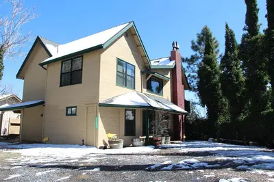 a house with snow on the front of it at Whole House at Eaglenest Inn with Pool & Seasonal SPA in Julian