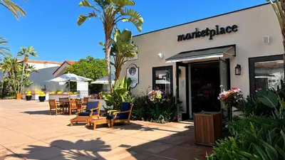 a store with chairs and tables outside of it at 2003 Costa Del Mar Road - Unit 676 in Carlsbad