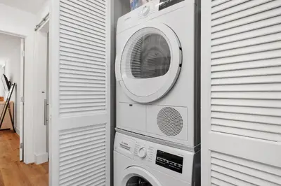 a white washer and dryer in a house at Dolphin's Drift - DMST50 in Solana Beach