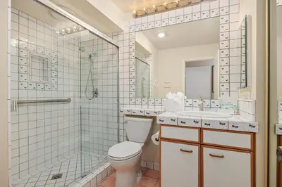 a bathroom with a toilet and a shower and a sink at Ocean Infinity - DMBC727B in Solana Beach
