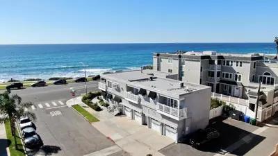 an aerial view of a building next to the ocean at 3690 Carlsbad Boulevard - Unit B in Carlsbad
