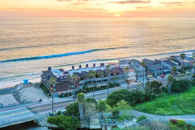 an aerial view of a house next to the ocean at 1445 S Pacific Street Unit E in Oceanside