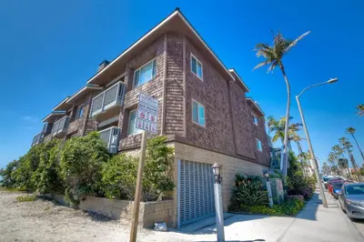 a building with a no parking sign in front of it at 1445 S Pacific Street Unit E in Oceanside