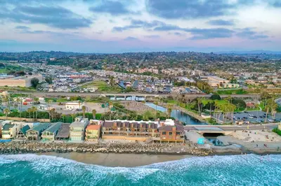 an aerial view of a resort on the beach at 1445 S Pacific Street Unit E in Oceanside