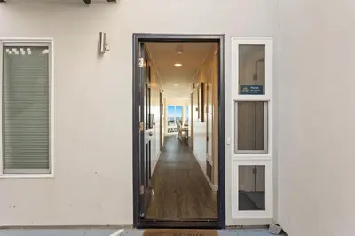 an open door to a hallway of a building at 1317 S Pacific - Entire Home in Oceanside