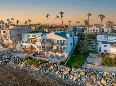 an aerial view of a building with a beach at 1317 S Pacific - Unit C in Oceanside