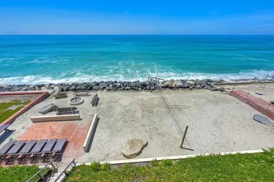 an empty beach with the ocean in the background at 1923 S Pacific in Oceanside
