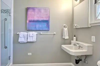 a bathroom with a sink and a shower at 1923 S Pacific in Oceanside
