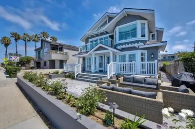 a large blue house with blue windows at 3636 Carlsbad Blvd - Upper in Carlsbad