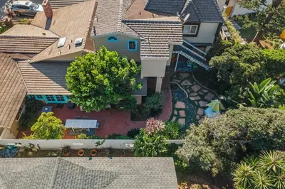 an aerial view of a house with a yard at 5051 Shore Drive in Carlsbad