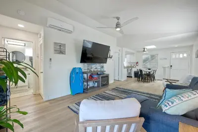 a living room with a couch and a tv at 1128 Tait Street Unit D in Oceanside