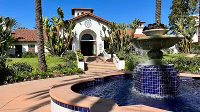 a water fountain in front of a house at 2003 Costa Del Mar Road - Unit 663 in Carlsbad