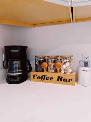 a coffee box sitting on a counter next to a coffee maker at Oceanview Suite Hilltop in San Diego