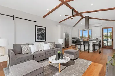 a living room with a couch and a table at 5194 Carlsbad - Entire Home in Carlsbad