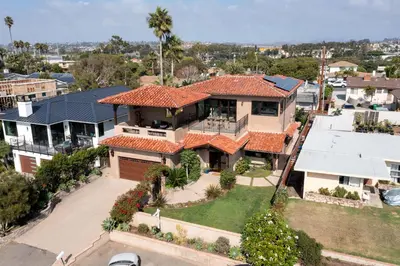 an aerial view of a house with a yard at 5194 Carlsbad - Entire Home in Carlsbad