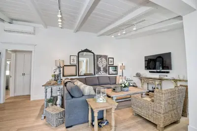 a living room with a couch and a table at 180 n 190 Walnut Entire Home in Carlsbad