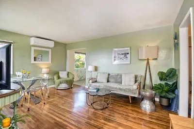 a living room with a couch and a table at 167 Tamarack in Carlsbad