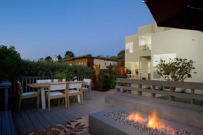 a patio with a table and a fire place at 327 Hillcrest Drive in Encinitas