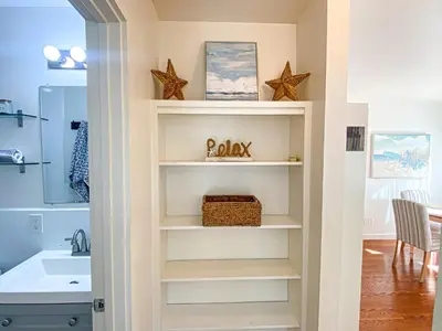 a bathroom with a built in book shelf at Hideaway in the heart of San Diego in San Diego