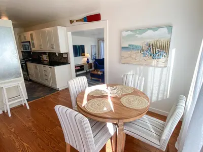 a dining room and kitchen with a table and chairs at Hideaway in the heart of San Diego in San Diego