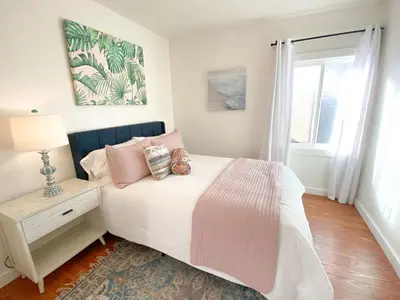 a bedroom with a bed and a window at Hideaway in the heart of San Diego in San Diego