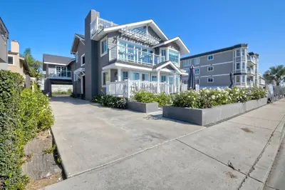a large house on the side of a street at 3636 Carlsbad Blvd - Entire Home in Carlsbad