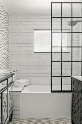a white bathroom with a tub and a window at Majestic Mermaid Retreat in San Diego