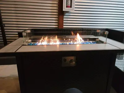 a grill with a bunch of fire in it at Harborside Suite 06 with Hot Tub and King Beds in San Diego