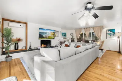 a living room with a couch and a ceiling fan at Entire Private Home with 4 Bedrooms 2 Bathrooms, Spacious, Lux King Bed, Ranch Style, Prime Area, Available Now in La Mesa