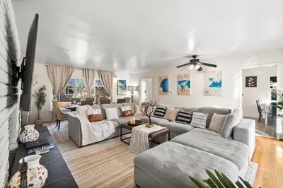 a living room with a couch and a table at Entire Private Home with 4 Bedrooms 2 Bathrooms, Spacious, Lux King Bed, Ranch Style, Prime Area, Available Now in La Mesa